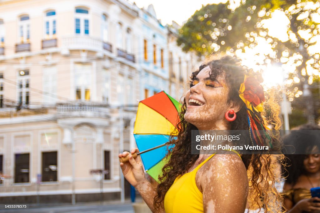 Portrait of young woman in backlight