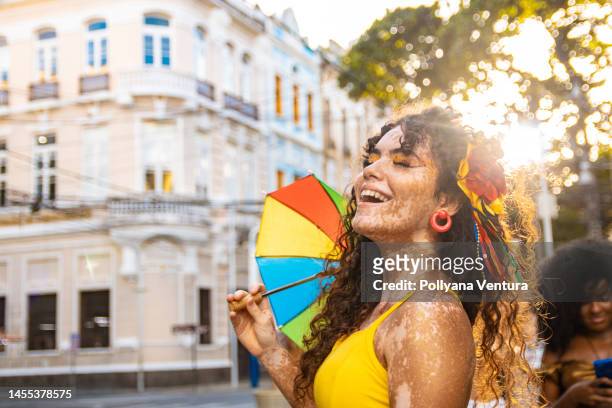 portrait of young woman in backlight - carnaval brasil stock pictures, royalty-free photos & images