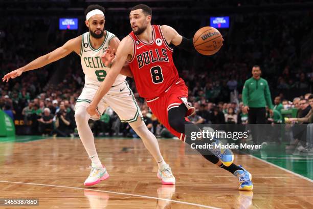 Zach LaVine of the Chicago Bulls drives to the basket past Derrick White of the Boston Celtics during the second half at TD Garden on January 09,...