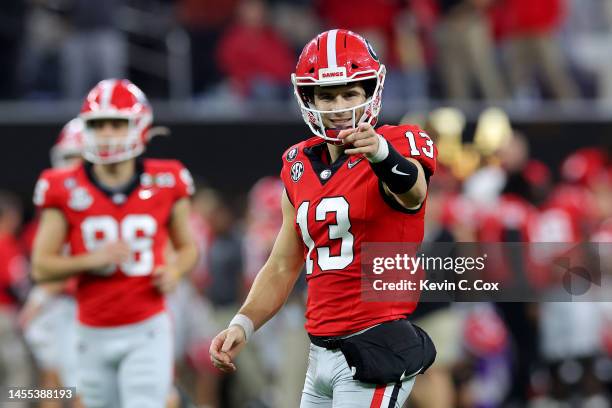 Stetson Bennett of the Georgia Bulldogs reacts after a passing touchdown in the third quarter against the TCU Horned Frogs in the College Football...