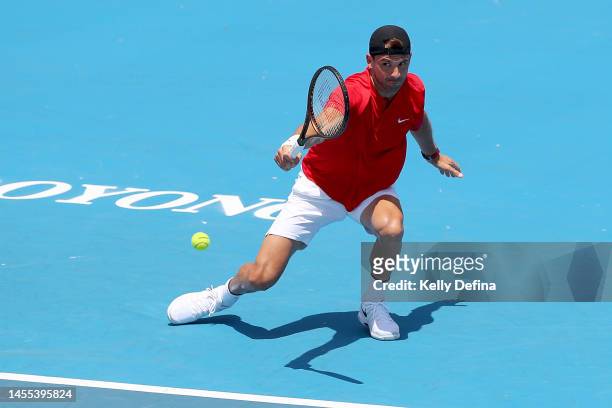 Grigor Dimitrov of Bulgaria plays a backhand during day one of the 2023 Kooyong Classic at Kooyong on January 10, 2023 in Melbourne, Australia.