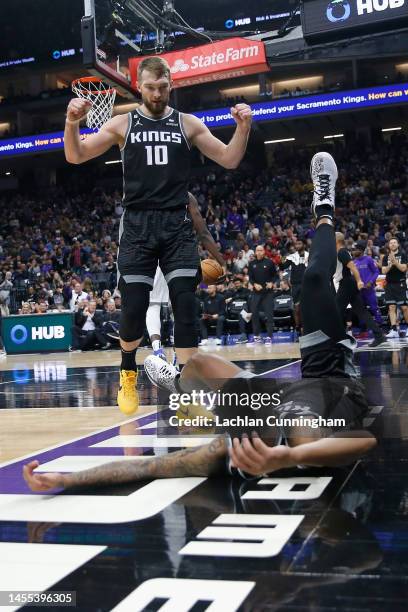 Domantas Sabonis of the Sacramento Kings reacts after teammate Malik Monk drew a foul against the Orlando Magic in the second quarter at Golden 1...