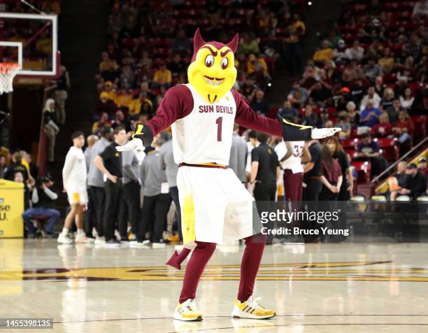 Sparky, the Arizona State Sun Devils mascot dances during a timeout in the first half of the game between the Washington Huskies and the Arizona...