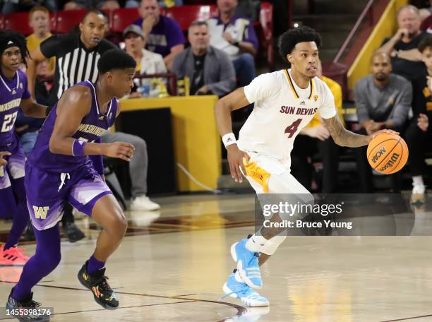 Desmond Cambridge Jr. #4 of the Arizona State Sun Devils dribbles upcourt during the first half of the game between the Washington Huskies and the...
