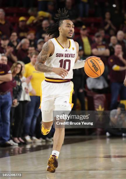 Frankie Collins of the Arizona State Sun Devils dribbles the ball downcourt during the first half of the game between the Washington Huskies and the...