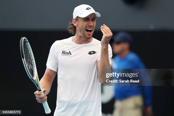 John Millman of Australia reacts as he competes against Albert Ramos-Vinolas of Spain during day two of the 2023 Adelaide International at Memorial...