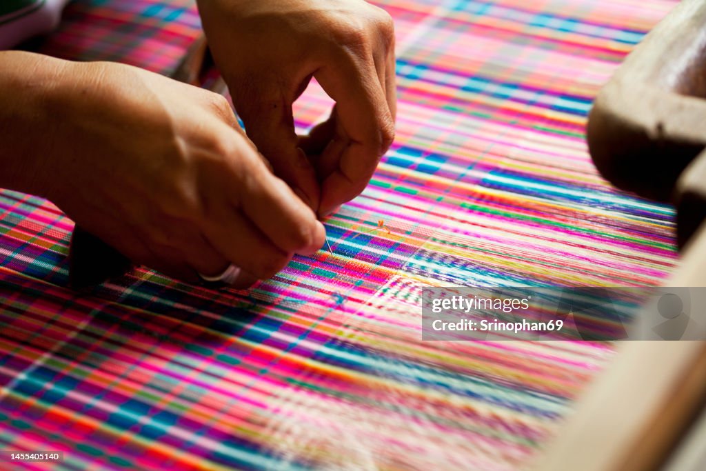 Colorful silk threads on the loom