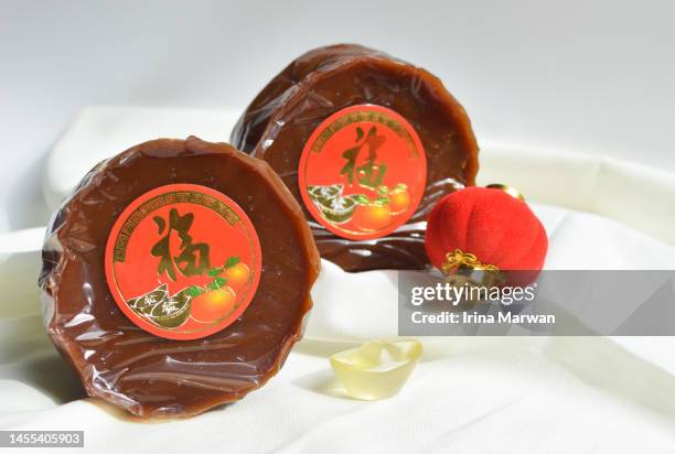 chinese new year's cake nian gao - yuanbao stock pictures, royalty-free photos & images