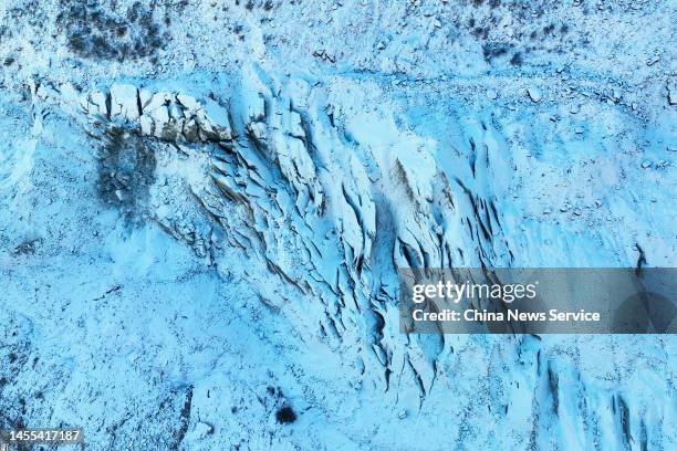 Aerial view of an icefall coming down from Gongga Mountain in Hailuogou Glacier Park, four months after the park was rattled by a magnitude-6.8...