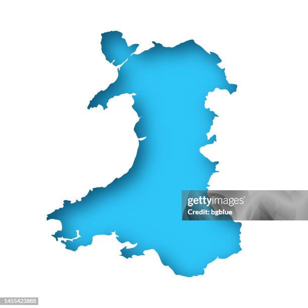 ilustrações de stock, clip art, desenhos animados e ícones de wales map - white paper cut out on blue background - país de gales