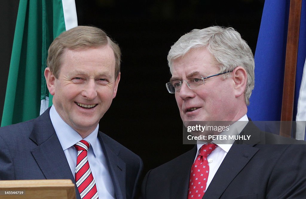 Ireland's Prime Minister Enda Kenny (L) 