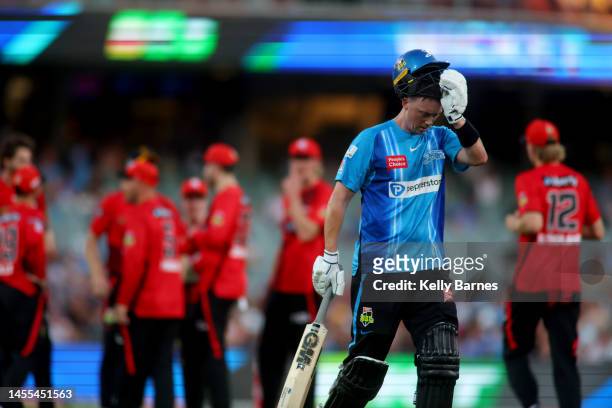 Adam Hose of the Strikers leaves the ground after getting out to a catch by Aaron Finch captain of the Renegades during the Men's Big Bash League...