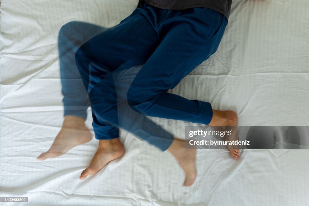 Young woman on the bed