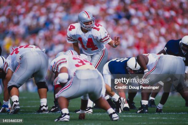 Bobby Hoying, Quarterback for the Ohio State Buckeyes calls the play on the line of scrimmage during the NCAA Big Ten conference college football...