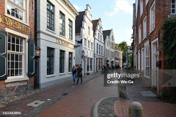 the town hall street in the old town of leer (east frisia). - leer ostfriesland stock pictures, royalty-free photos & images