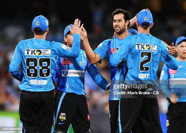 Wes Agar of the Strikers celebrates the wicket of Martin Guptill of the Renegades during the Men's Big Bash League match between the Adelaide...