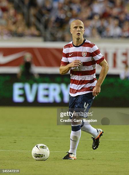 Michael Bradley of Team USA sizes up the defense of Team Scotland on May 26, 2012 at EverBank Field in Jacksonville, Florida.