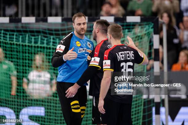 Andreas Wolff, Jannik Kohlbacher, Lukas Mertens of Germany shake hands after the handball international friendly match between Germany and Iceland at...