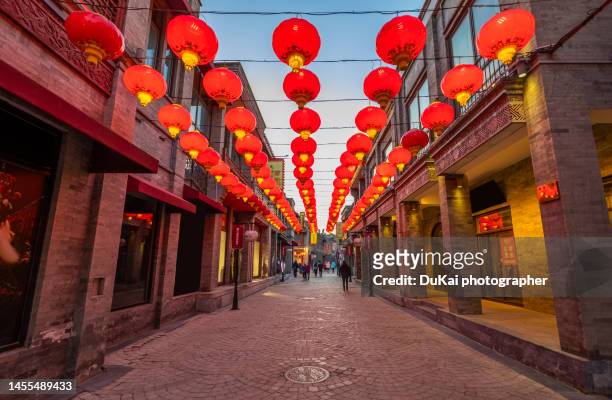 chinese new year  in beijing,qianmen,dashilan street - dukai photo beijing stock-fotos und bilder