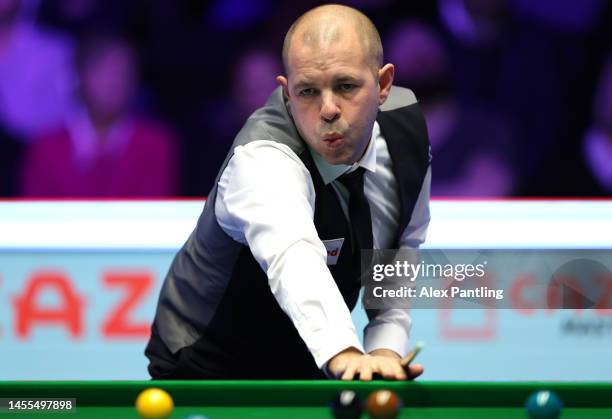 Barry Hawkins of England reacts during their first round match against Mark Allen of Northern Ireland at Alexandra Palace on January 10, 2023 in...