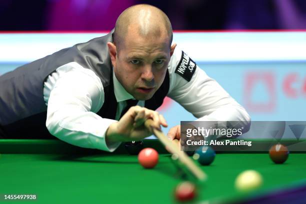 Barry Hawkins of England plays a shot during their first round match against Mark Allen of Northern Ireland at Alexandra Palace on January 10, 2023...