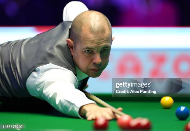 Barry Hawkins of England plays a shot during their first round match against Mark Allen of Northern Ireland at Alexandra Palace on January 10, 2023...
