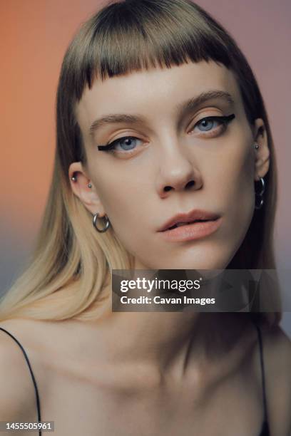 model with a bang and makeup with liner - bangs bildbanksfoton och bilder