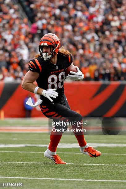 Hayden Hurst of the Cincinnati Bengals runs with the ball during the game against the Baltimore Ravens at Paycor Stadium on January 8, 2023 in...