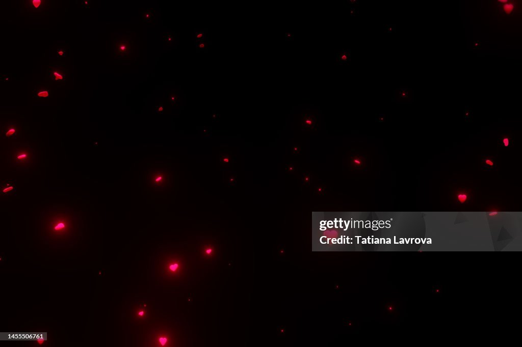 Many heart shaped illuminating particles. Abstract 3d rendered illustration symbolizing Valentines Day. Glowing hearts background. Trendy color 2023 viva magenta