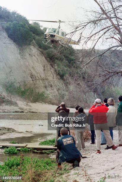 Director John Landis, Los Angeles Superior Court Judge Roger W. Boren and Court Officials watch a Los Angeles County Fire Department helicopter fly a...