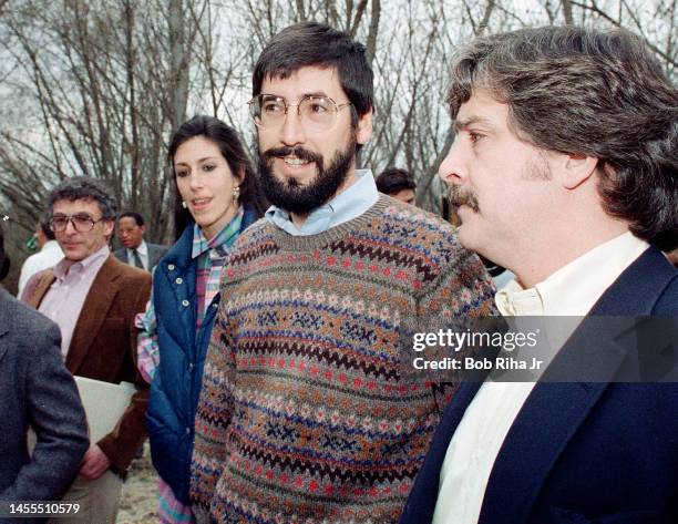 Director John Landis, talks with representative after a Los Angeles County Fire Department helicopter flew a similar route above the Santa Clara...
