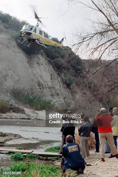 Director John Landis, Los Angeles Superior Court Judge Roger W. Boren and Court Officials watch a Los Angeles County Fire Department helicopter fly a...