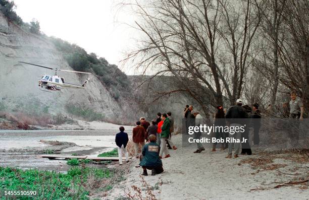 Director John Landis, Los Angeles Superior Court Judge Roger W. Boren and Court Officials watch a Los Angeles County Fire Department helicopter fly a...