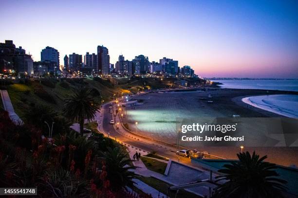 mar del plata, buenos aires, argentina. the coast, the beach, the sea and the buildings of the city at sunset. - mar del plata stock pictures, royalty-free photos & images