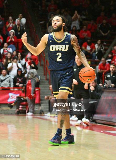 Kareem Thompson of the Oral Roberts Golden Eagles Kareem Thompson of the Oral Roberts Golden Eagles dribbles against the New Mexico Lobos during the...