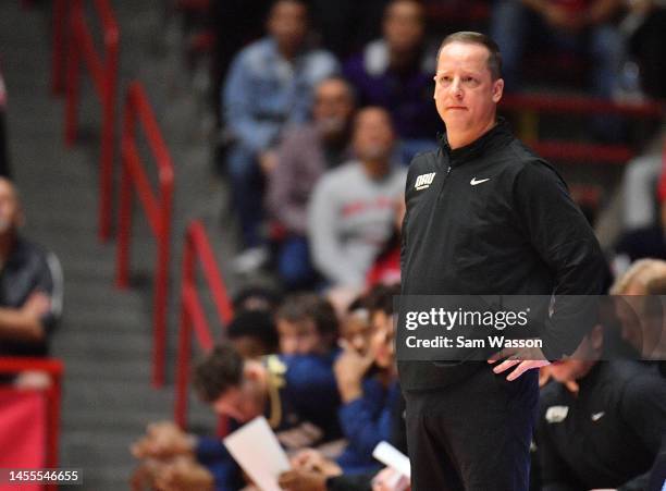 Head coach Paul Mills of the Oral Roberts Golden Eagles looks on during the first half of his team's game against the New Mexico Lobos at The Pit on...