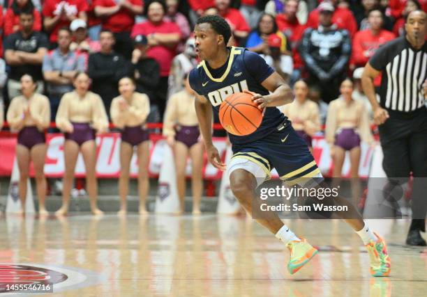 Max Abmas of the Oral Roberts Golden Eagles dribbles against the New Mexico Lobos during the first half of their game at The Pit on January 09, 2023...