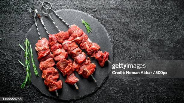 high angle view of food on table,pakistan - schaschlik stock-fotos und bilder