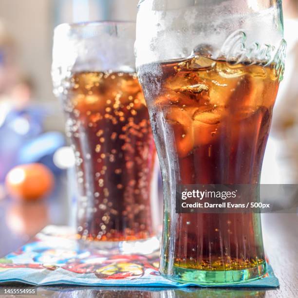 close-up of beer glasses on table,bradford,united kingdom,uk - cola stock pictures, royalty-free photos & images