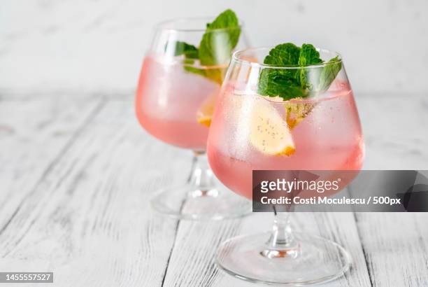 close-up of drinks on table,romania - brandy snifter stock pictures, royalty-free photos & images