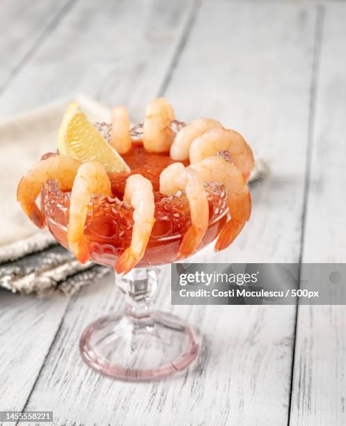 shrimp cocktail garnished with lemon wedge,romania - prawn cocktail stock pictures, royalty-free photos & images