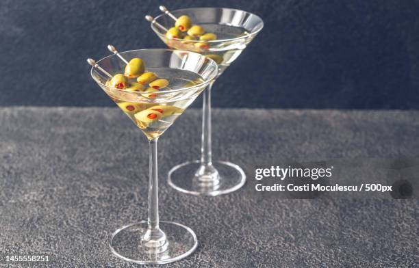 close-up of champagne flutes on table,romania - martini stockfoto's en -beelden