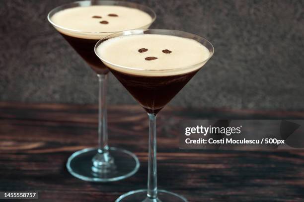 espresso martini cocktails garnished with coffee beans,romania - expresso stock pictures, royalty-free photos & images