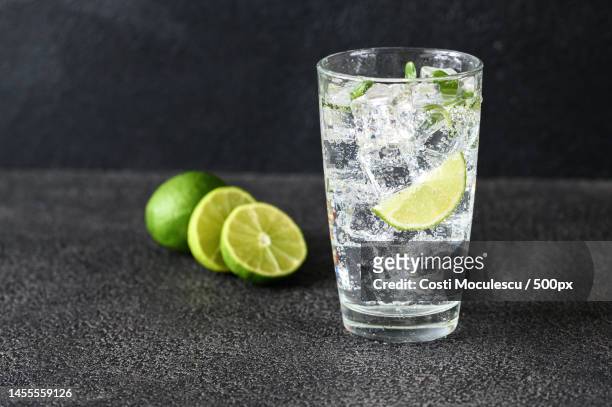 close-up of drink on table,romania - gin tonic stock-fotos und bilder