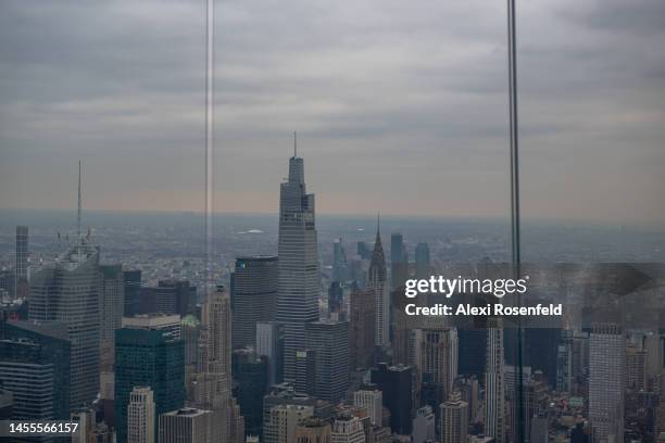 The Midtown Manhattan skyline is visible from the outdoor deck at The Edge at Hudson Yards on opening day of Sky Skate on January 10, 2023 in New...