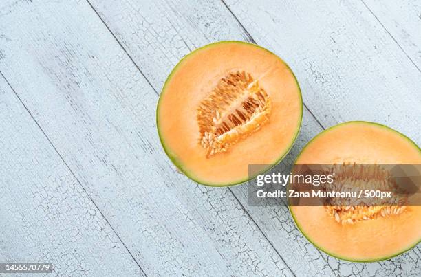 cross section of cantaloupe melon flat lay,romania - メロン ストックフォトと画像