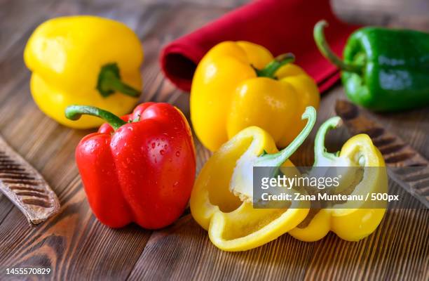 close-up of vegetables on table,romania - poivron jaune photos et images de collection