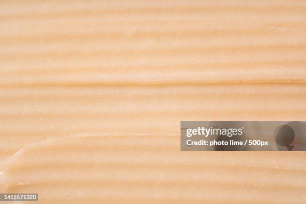 hair conditioner cream background yellow cosmetic lotion moisturiser - lime hair stock pictures, royalty-free photos & images