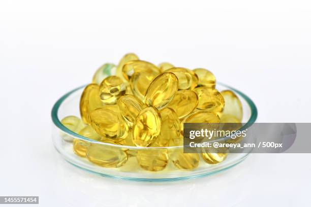 soft gelatin capsules of essential oils,bangkok,thailand - cod liver oil stock pictures, royalty-free photos & images