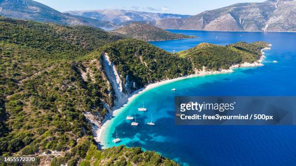 high angle view of sea and mountains,gidaki beach,greece - gidaki beach stock pictures, royalty-free photos & images